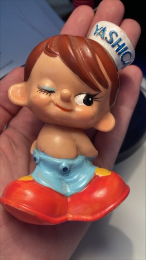Figurine de pub pour la marque YASHICA